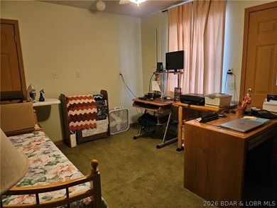 This lakefront homes has many pluses: one level living, attached - photo 41