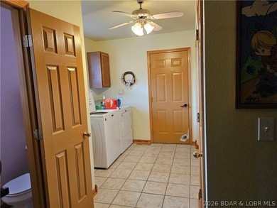 This lakefront homes has many pluses: one level living, attached - photo 46
