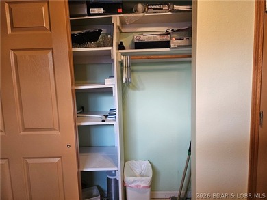 This lakefront homes has many pluses: one level living, attached - photo 50