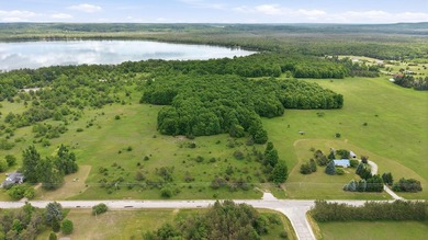 Prime 10-Acre Emmet County Lot with Larks Lake Backyard! Build - photo 4