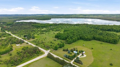 Prime 10-Acre Emmet County Lot with Larks Lake Backyard! Build - photo 6