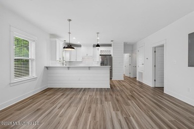 Enjoy living in the heart of Downtown Pass Christian. This - photo 11