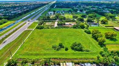 Two adjacent parcels totaling 6.4 acres present a rare - photo 1