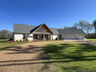 Nestled on 40.2+/- acres of stunning countryside, this property - Lake Home Sale Pending in Brookhaven, Mississippi