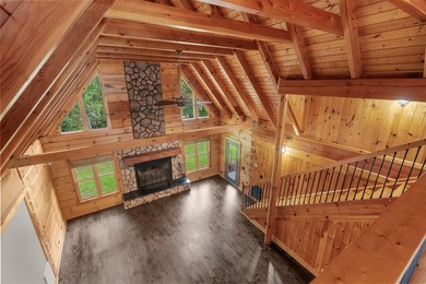 Step inside and the drama begins immediately. Soaring ceilings - photo 12