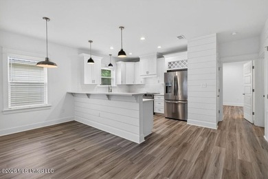 Enjoy living in the heart of Downtown Pass Christian. This - photo 12