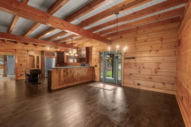 Step inside and the drama begins immediately. Soaring ceilings - photo 13