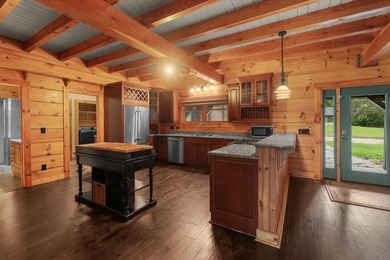 Step inside and the drama begins immediately. Soaring ceilings - photo 14