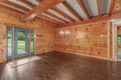 Step inside and the drama begins immediately. Soaring ceilings - photo 20
