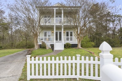 This two-story Coastal Southern Style home is nestled in a - photo 1