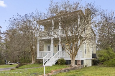 This two-story Coastal Southern Style home is nestled in a - photo 2