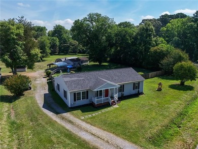Enjoy peaceful country living on 1.77 acres in the highly - photo 2