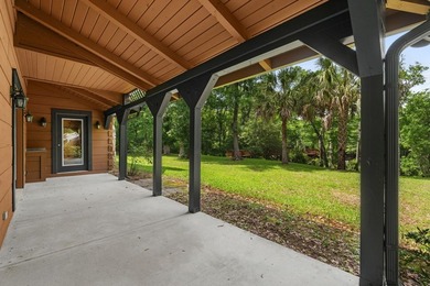 Step inside and the drama begins immediately. Soaring ceilings - photo 23