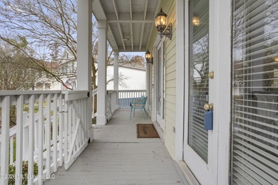 This two-story Coastal Southern Style home is nestled in a - photo 4