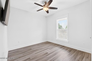 Enjoy living in the heart of Downtown Pass Christian. This - photo 25