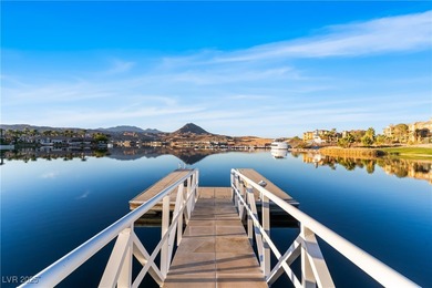 WATERFRONT CUSTOM HOME WITH DOCK. This 3100 sq ft home is a set