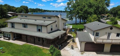 Stunning Lakefront Living with Incredible Income Potential! - photo 1