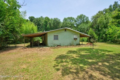 This unique 3 acre old homestead sits directly on the - photo 15