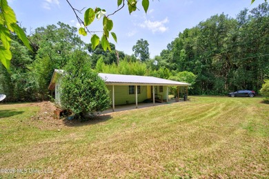 This unique 3 acre old homestead sits directly on the - photo 16
