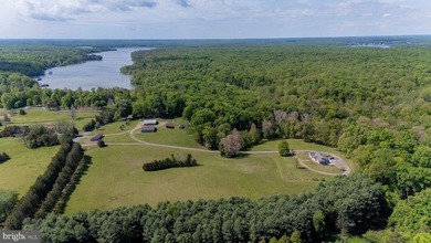 Set on 30 picturesque acres, this exceptional farm offers the - photo 1