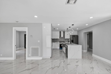 Stunning Fully Renovated 4-Bedroom, 3-Bathroom Modern Oasis with - photo 11