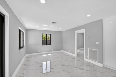 Stunning Fully Renovated 4-Bedroom, 3-Bathroom Modern Oasis with - photo 12