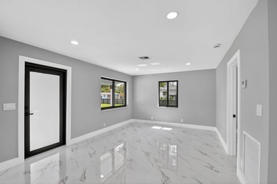 Stunning Fully Renovated 4-Bedroom, 3-Bathroom Modern Oasis with - photo 13
