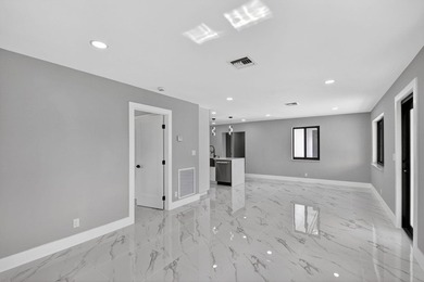 Stunning Fully Renovated 4-Bedroom, 3-Bathroom Modern Oasis with - photo 15