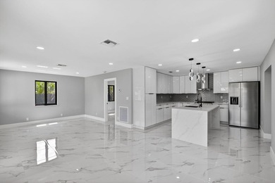 Stunning Fully Renovated 4-Bedroom, 3-Bathroom Modern Oasis with - photo 18