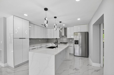 Stunning Fully Renovated 4-Bedroom, 3-Bathroom Modern Oasis with - photo 20