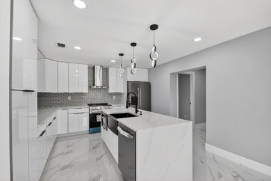 Stunning Fully Renovated 4-Bedroom, 3-Bathroom Modern Oasis with - photo 21