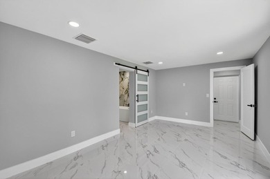 Stunning Fully Renovated 4-Bedroom, 3-Bathroom Modern Oasis with - photo 29
