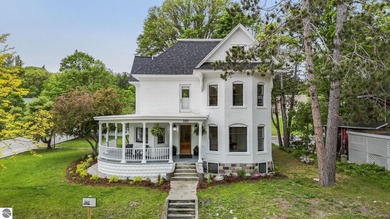 Antrim County Chain of Lakes Home For Sale in Bellaire Michigan