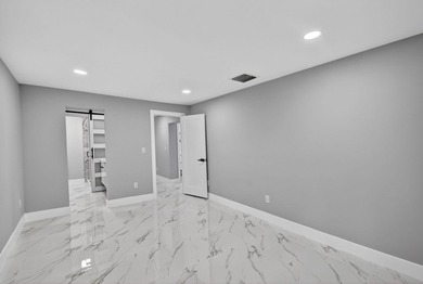 Stunning Fully Renovated 4-Bedroom, 3-Bathroom Modern Oasis with - photo 40