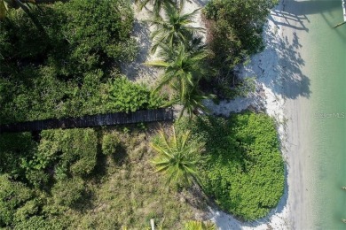 Located in the Boca Grande community of Gulf Shores North, this - photo 3