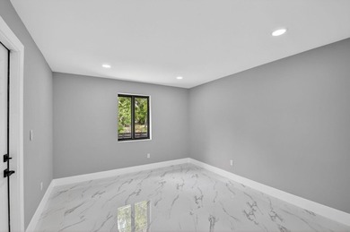 Stunning Fully Renovated 4-Bedroom, 3-Bathroom Modern Oasis with - photo 47