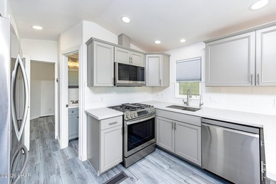 Beautifully remodeled home in Sam's Beachcomber - Unit D26! - photo 10