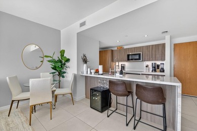 Turnkey coastal living awaits in this beautifully furnished - photo 3