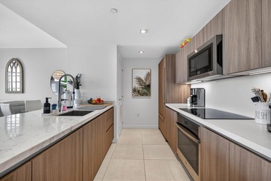 Turnkey coastal living awaits in this beautifully furnished - photo 4