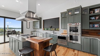 Welcome to 428 River Bend Drive, a stunning home perched on a - photo 15