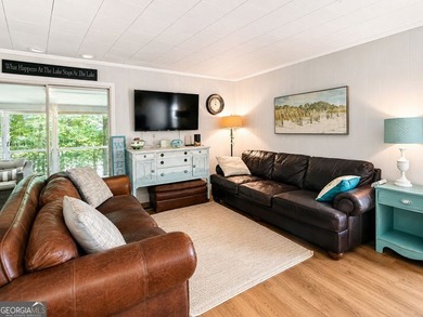 This cute cabin on year-round deep water is the lakefront - photo 2