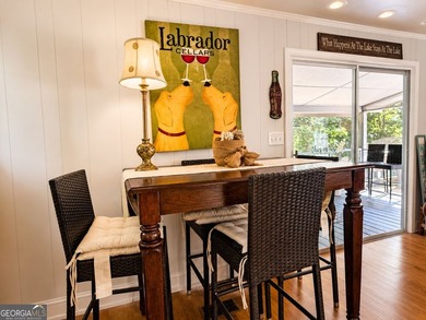 This cute cabin on year-round deep water is the lakefront - photo 5