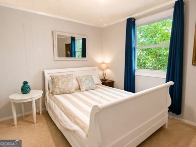 This cute cabin on year-round deep water is the lakefront - photo 6
