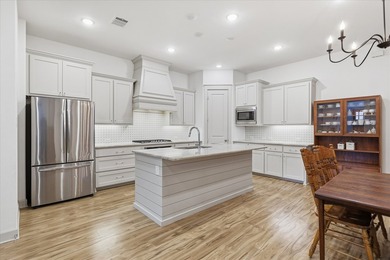 Welcome to 241 Harbor Hills, a charming Normandy-style home in - photo 6