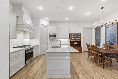 Welcome to 241 Harbor Hills, a charming Normandy-style home in - photo 7
