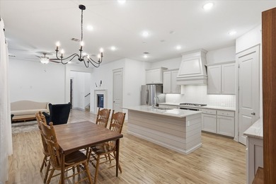 Welcome to 241 Harbor Hills, a charming Normandy-style home in - photo 8