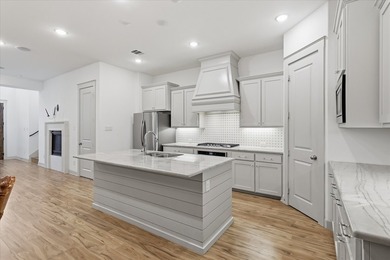 Welcome to 241 Harbor Hills, a charming Normandy-style home in - photo 9