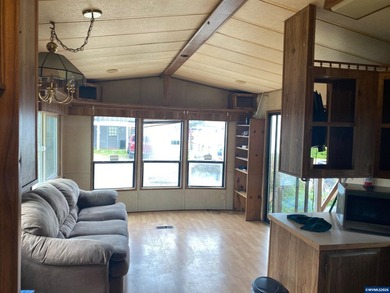 Tiny home on it's own land with 2 outbuildings and covered area - photo 7