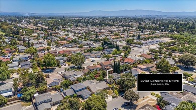 This spacious 4-bedroom, 3-bathroom Spanish Colonial Revival - photo 7