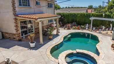 This spacious 4-bedroom, 3-bathroom Spanish Colonial Revival - photo 9